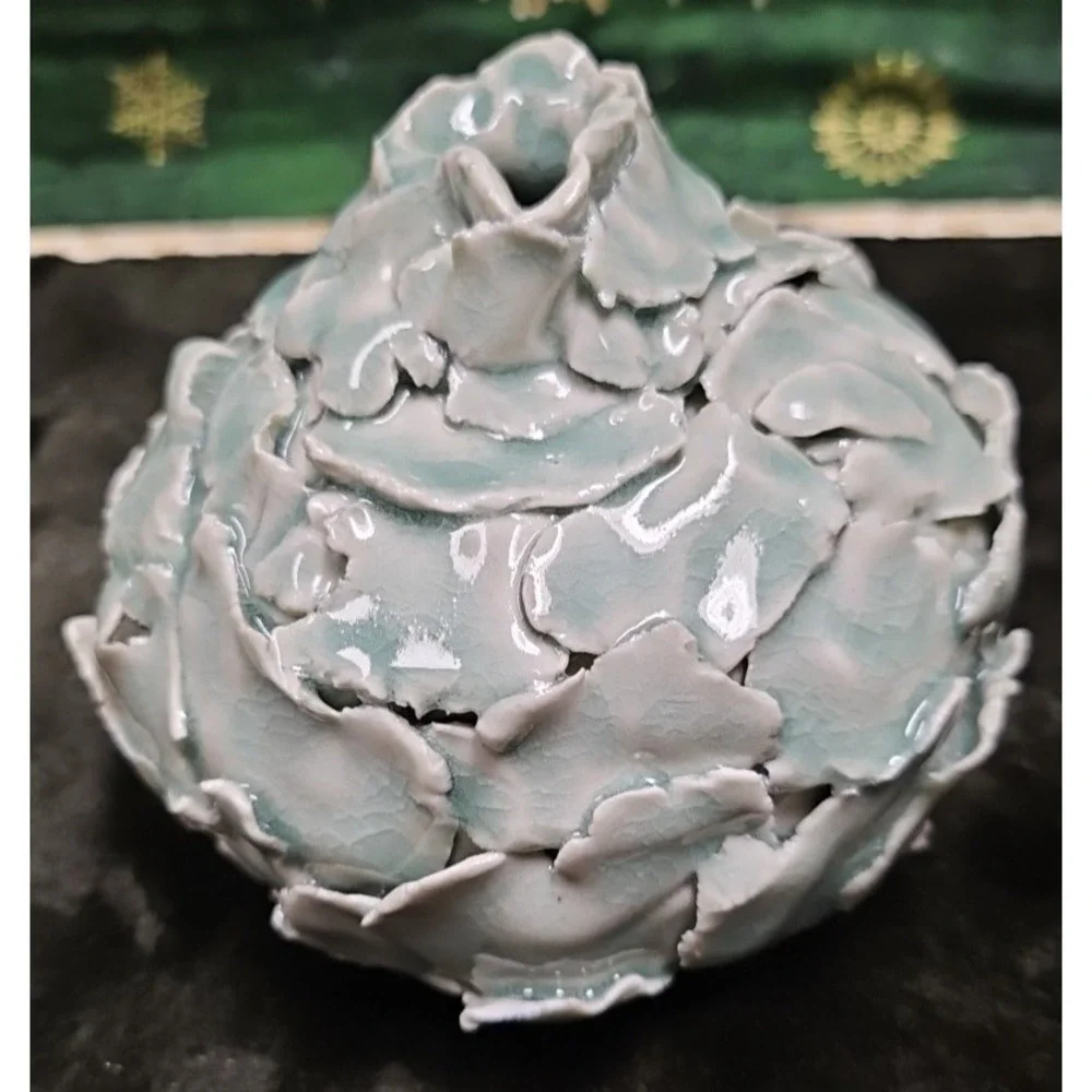 Small round vase with patchwork pieces of pottery. 4.5